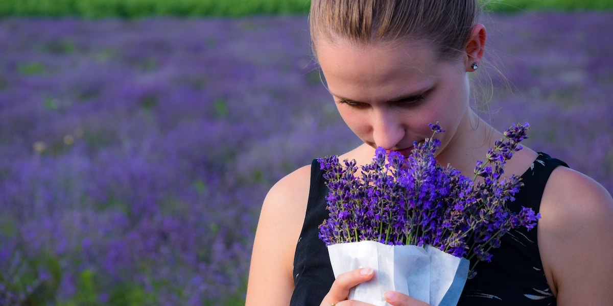 Woman smelling lavendar