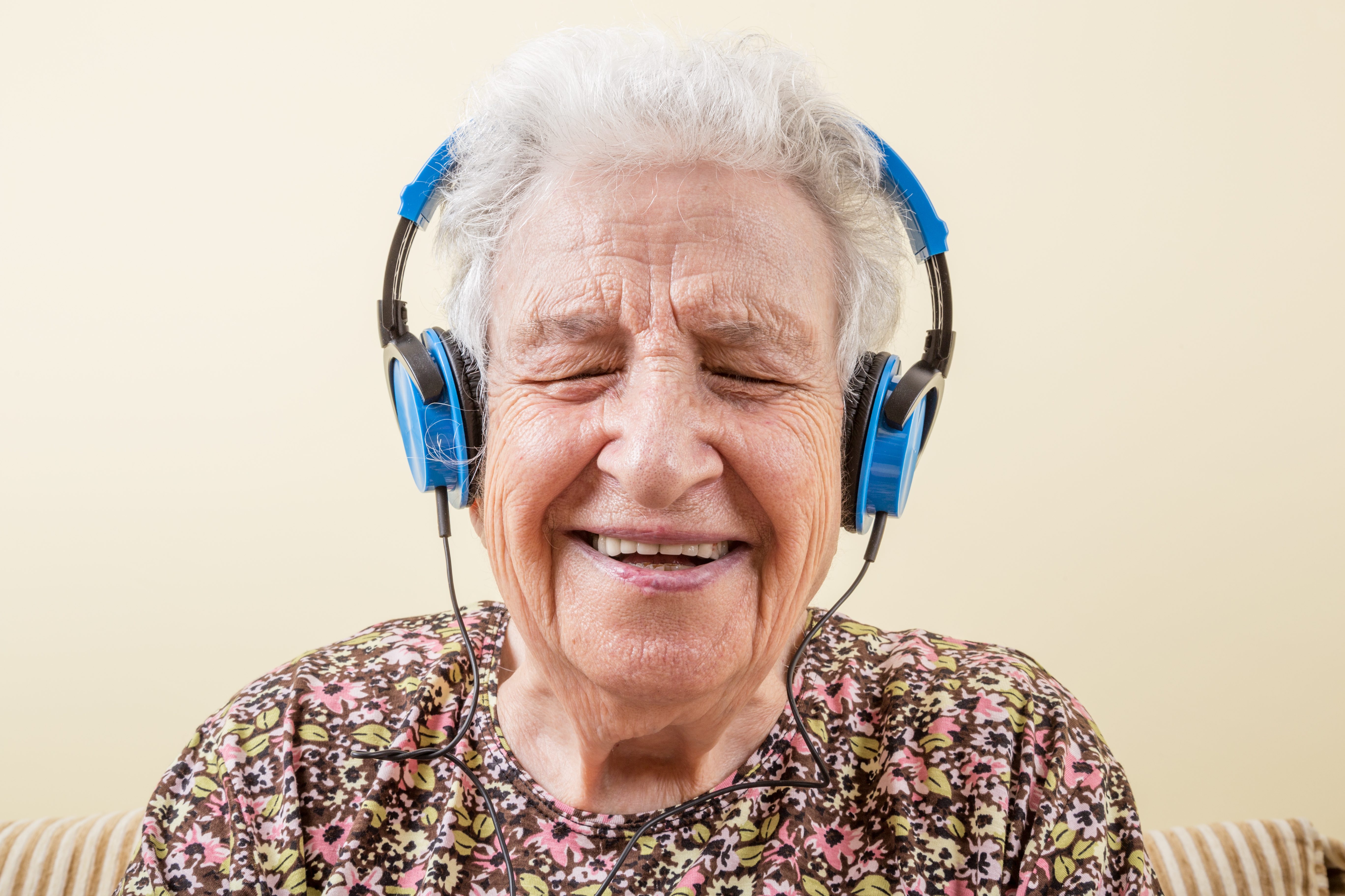 Senior headphones Shutterstock Berna Namoglu