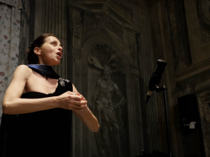 Woman singing at Sound Resonance concert